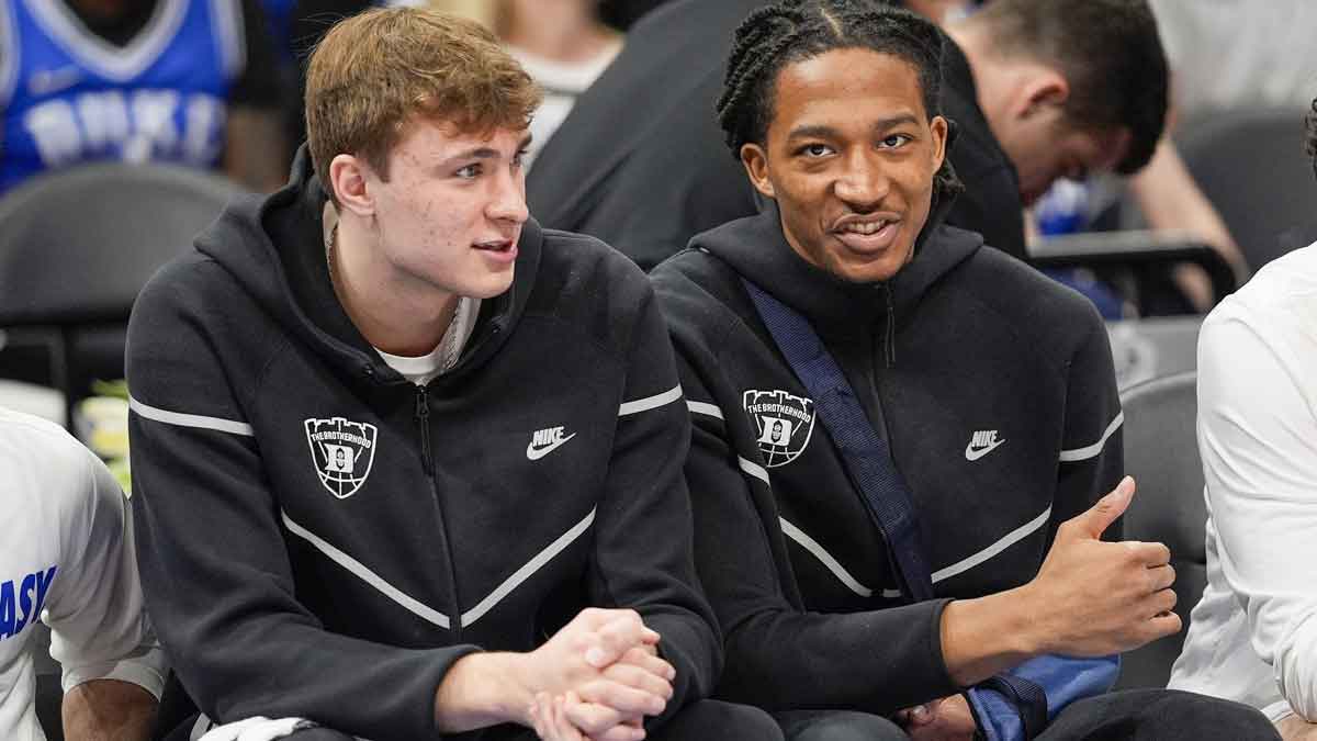 Duke Blue Devils forward Cooper Flagg (2) and forward Maliq Brown (6) on the bench during the first half against the North Carolina Tar Heels at Spectrum Center.