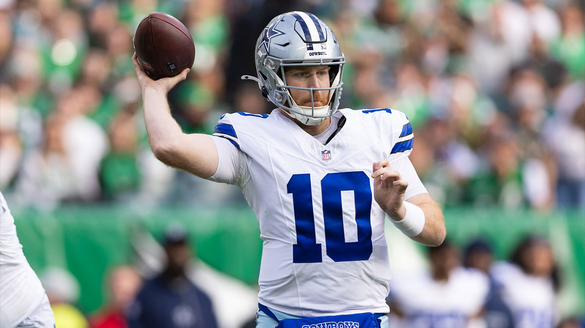 Dec 29, 2024; Philadelphia, Pennsylvania, USA; Dallas Cowboys quarterback Cooper Rush (10) passes the ball against the Philadelphia Eagles during the second quarter at Lincoln Financial Field.