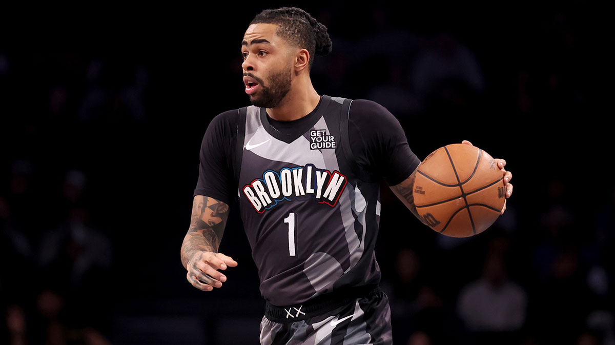 Brooklyn Nets guard D'Angelo Russell (1) brings the ball up court against the Philadelphia 76ers during the second quarter at Barclays Center.