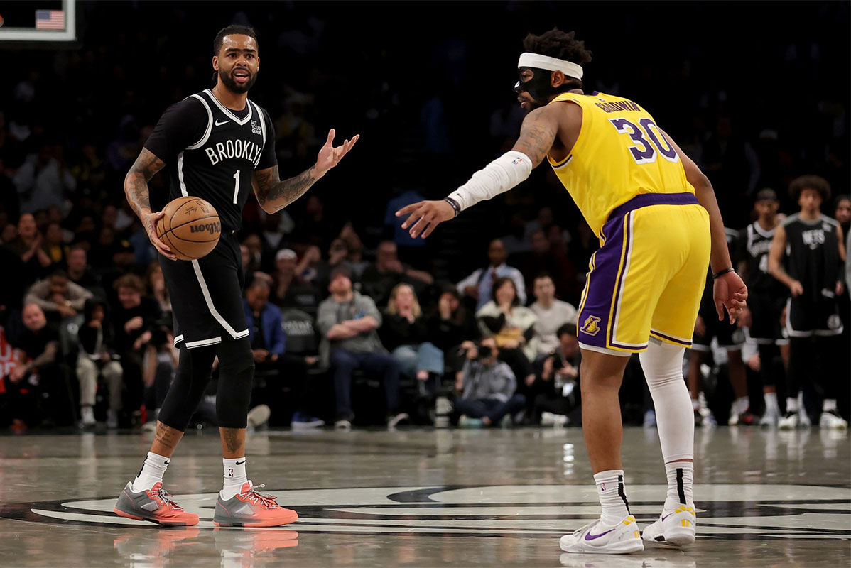 Brooklyn Nets Guard D'Angelo Russell (1) Brings a ball against Los Angeles Lakers Guard Jordan Goodwin (30) during the fourth quarter in the center of Barclays.