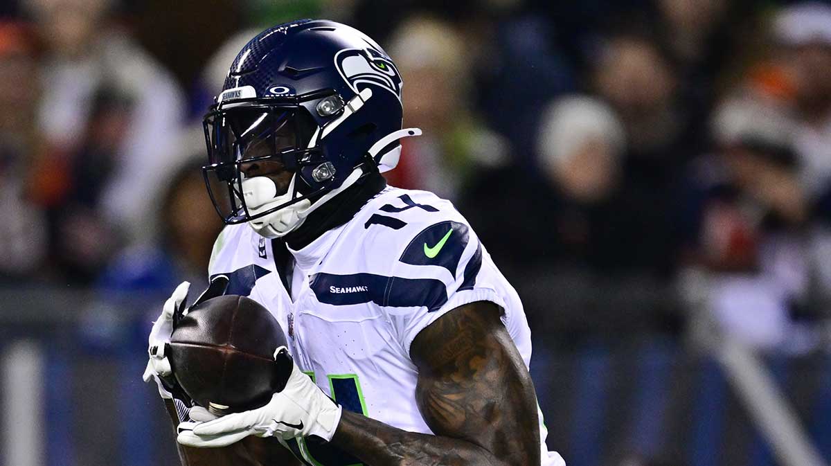 Dec 26, 2024; Chicago, Illinois, USA; Seattle Seahawks wide receiver DK Metcalf (14) makes a catch against the Chicago Bears during the first quarter at Soldier Field.