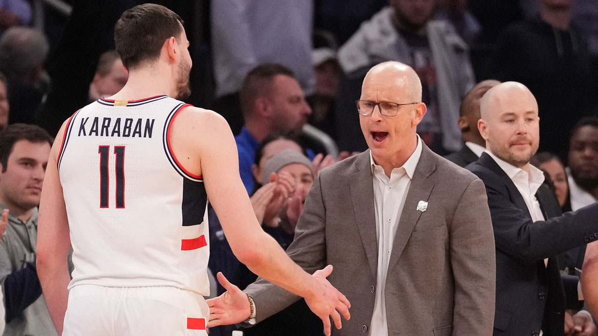 Connecticut Huskies head coach Dan Hurley greets Connecticut Huskies forward Alex Karaban (11) after he left the game late in the 2nd half against the Villanova Wildcats at Madison Square Garden.