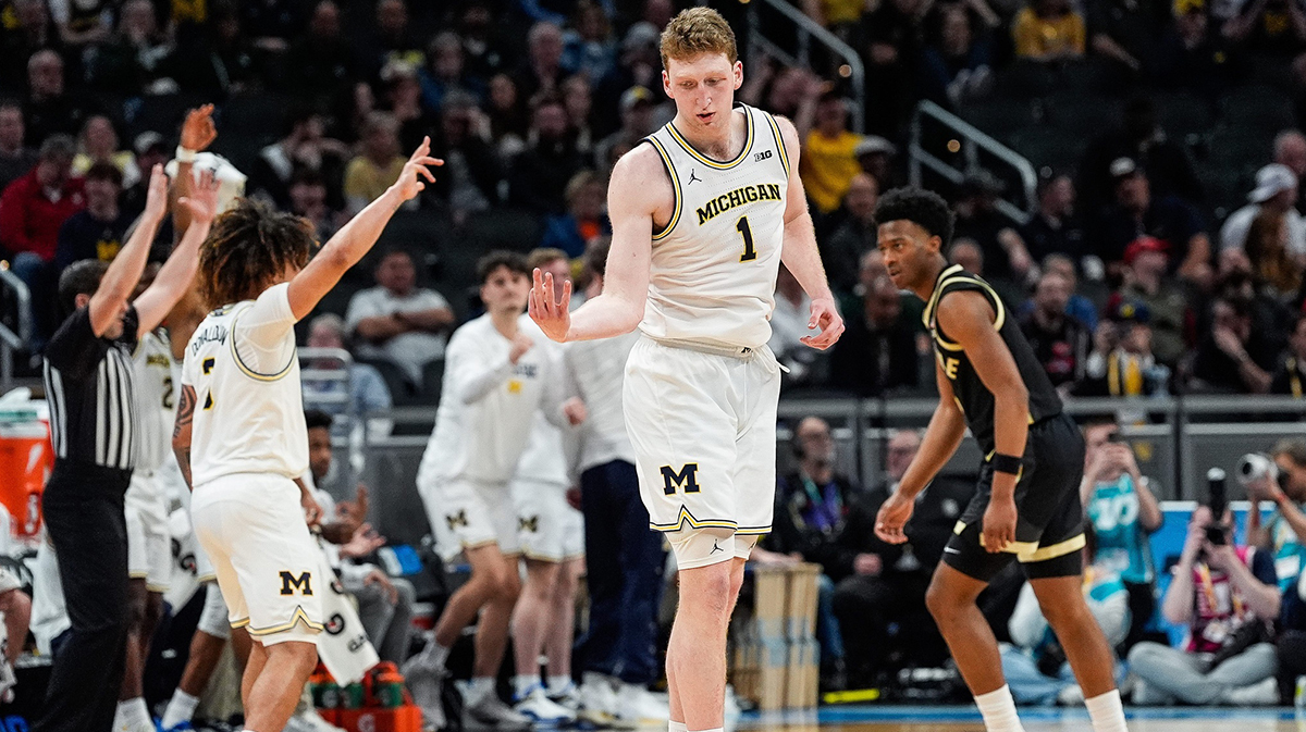 Michigan center Danny Wolf (1) celebrates a three point basket against Purdue during the second half of Big Ten Tournament quarterfinal at Gainbridge Fieldhouse in Indianapolis, Ind. on Friday, March 14, 2025.