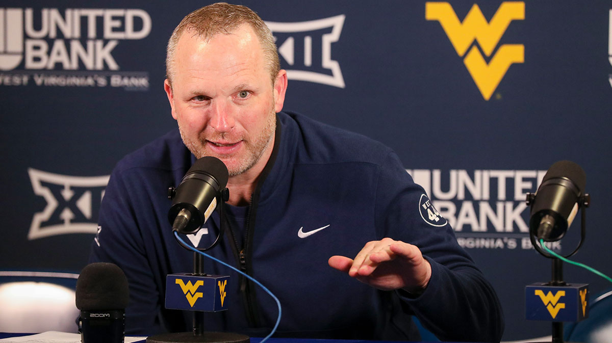 West Virginia Mountaineers head coach Darian DeVries answers questions from the media after defeating the UCF Knights at WVU Coliseum.
