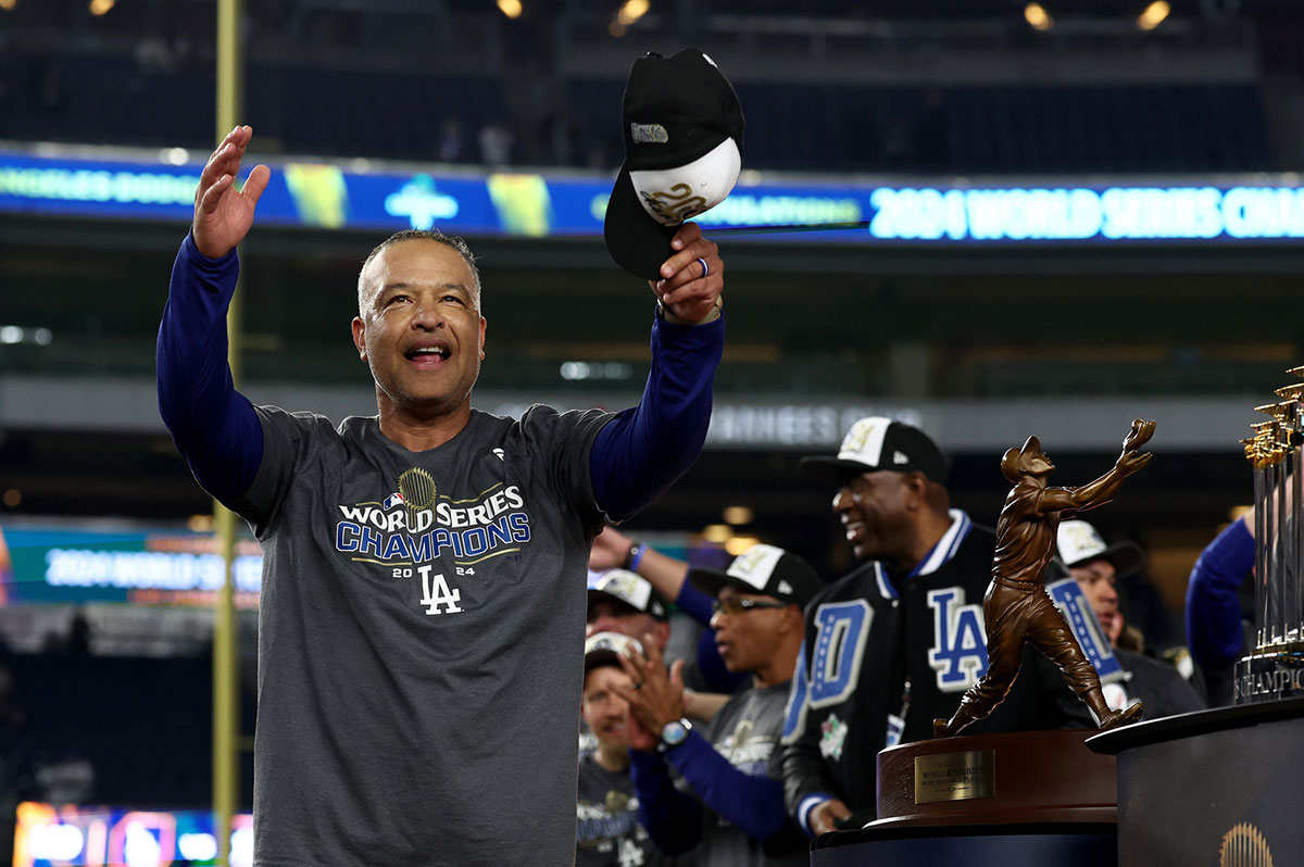 Los Angeles Dodgers manager Dave Roberts (30) celebrates after winning the 2024 MLB World Series against the New York Yankees at Yankee Stadium. Mandatory Credit