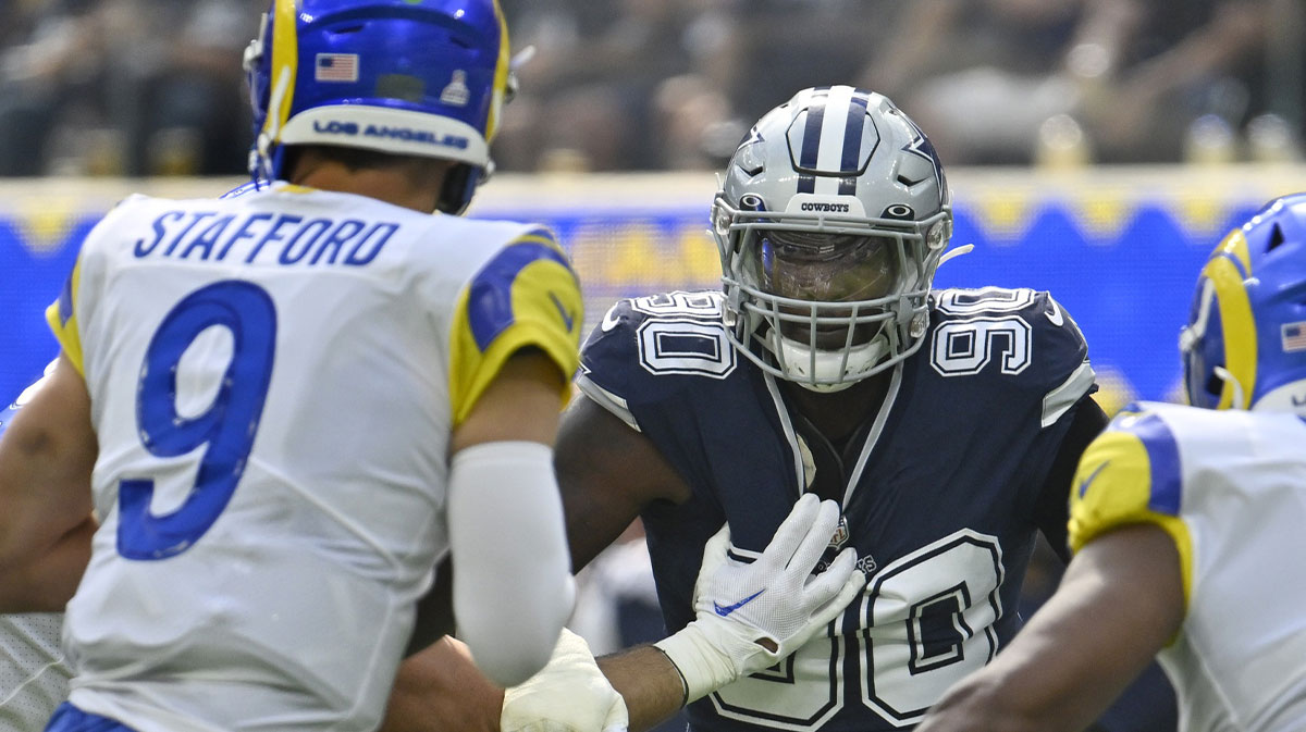 Oct 9, 2022; Inglewood, California, USA; Dallas Cowboys defensive end DeMarcus Lawrence (90) pressures Los Angeles Rams quarterback Matthew Stafford (9) during the first quarter at SoFi Stadium.