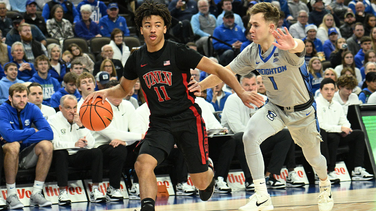 UNLV Rebels guard Dedan Thomas Jr. (11) dribbles against Creighton Bluejays guard Steven Ashworth (1) in the first half at CHI Health Center Omaha. Mandatory Credit: Steven Branscombe-Imagn Images
