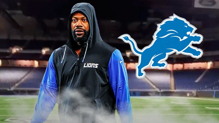 Lions' Za'Darius Smith with stoic expression, Lions logo next to him