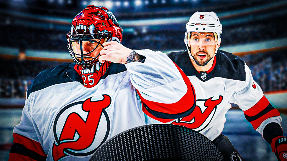 Brendan Dillon and Jacob Markstrom both looking stern, hockey rink in background New Jersey Devils