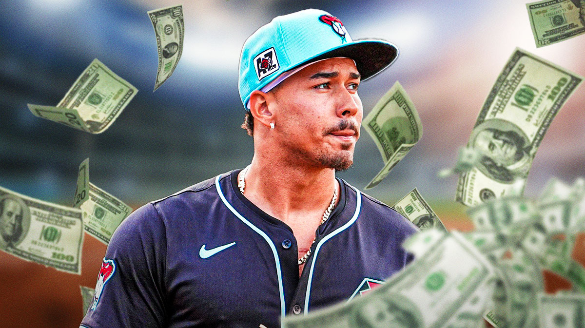 Justin Martinez with a bunch of money falling around him