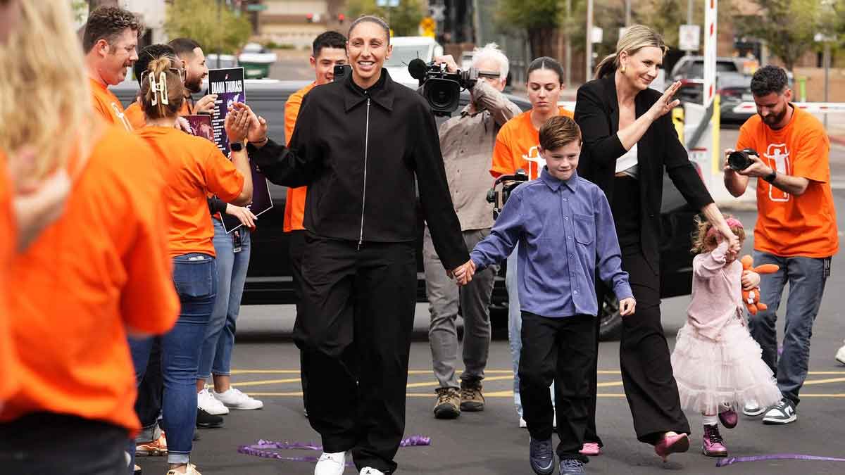 After playing 20 seasons with the Phoenix Mercury, WNBA All-Star Diana Taurasi and her family arrive for her retirement news conference at the Phoenix Mercury's practice facility on March 13, 2025.