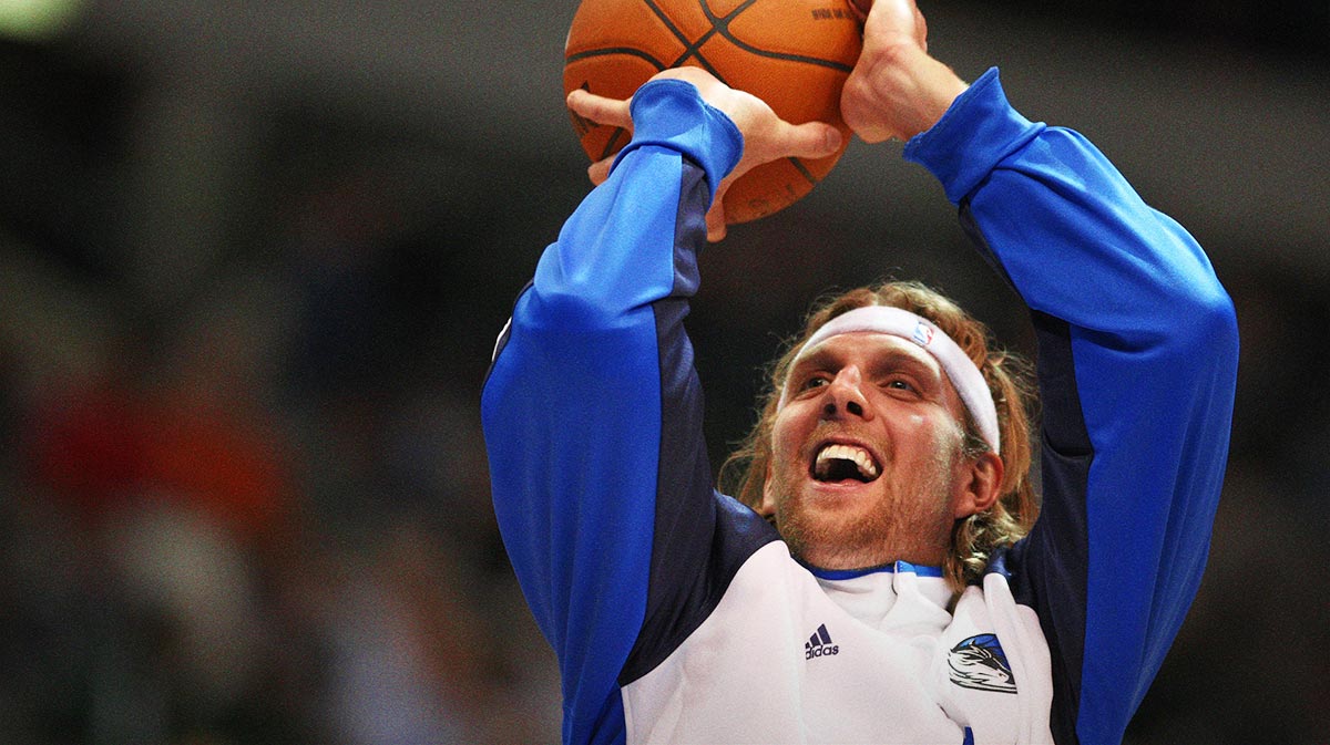 Dallas Mavericks forward Dirk Nowitzki (41) smiles during warm-ups before the game against the New Orleans Hornets at American Airlines Arena. The Mavs beat the Hornets 94-90.