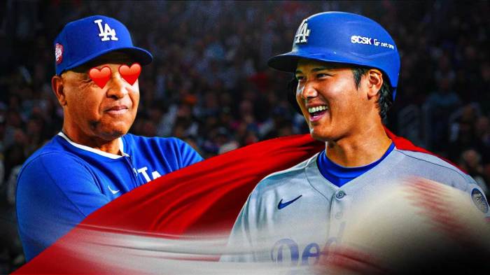 Photo: Shohei Ohtani in Dodgers jersey with a superman cape on, Dave Roberts looking at him with heart eyes