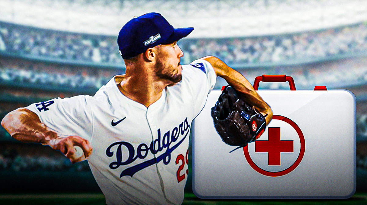 Michael Grove (Dodgers) throwing a pitch, first aid kit behind him and Dodger Stadium background