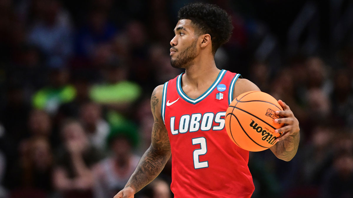 New Mexico Lobos guard Donovan Dent (2) dribbles in the first half against the Michigan State Spartans during the NCAA Tournament Second Round at Rocket Arena.