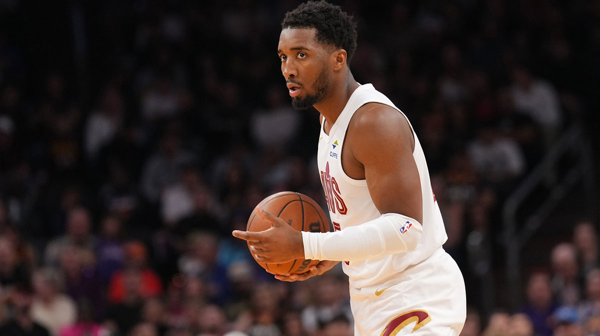 Cleveland Cavaliers guard Donovan Mitchell (45) controls the ball against the Phoenix Suns during the first half at Footprint Center.