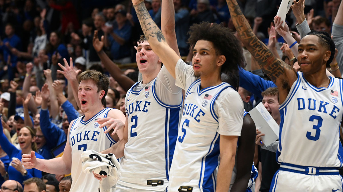Duke Blue Devils forward Kon Knueppel (7) forward Cooper Flagg (2) guard Tyrese Proctor (5) and forward Isaiah Evans (3) react during the second half against the Wake Forest Demon Deacons at Cameron Indoor Stadium. The Blue Devils won 93-60.