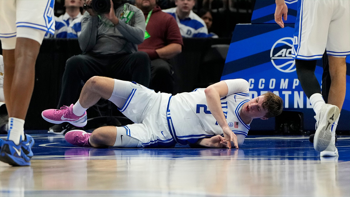 Duke Blue Devils forward Cooper Flagg (2) is injured in the first half at Spectrum Center.