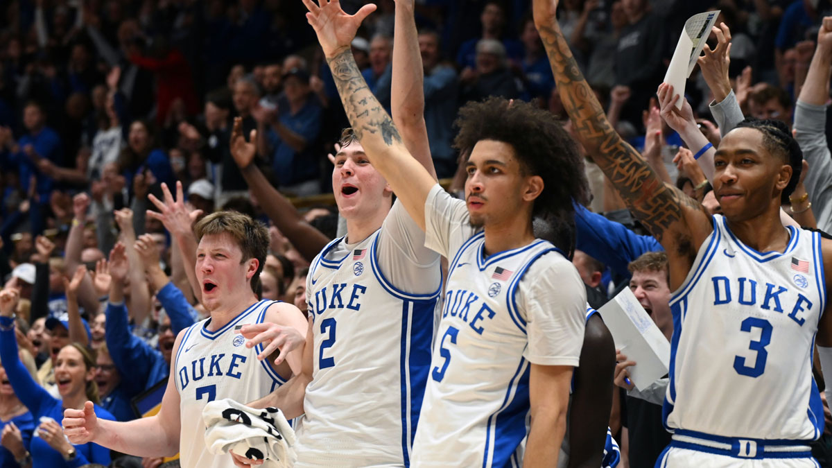 Duke Blue Devils forward Kon Knueppel (7) forward Cooper Flagg (2) guard Tyrese Proctor (5) and forward Isaiah Evans (3) react during the second half against the Wake Forest Demon Deacons at Cameron Indoor Stadium. The Blue Devils won 93-60. 