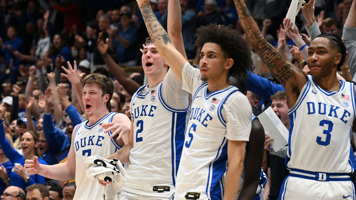 Duke Blue Devils forward Kon Knueppel (7) forward Cooper Flagg (2) guard Tyrese Proctor (5) and forward Isaiah Evans (3) react during the second half against the Wake Forest Demon Deacons at Cameron Indoor Stadium. The Blue Devils won 93-60.