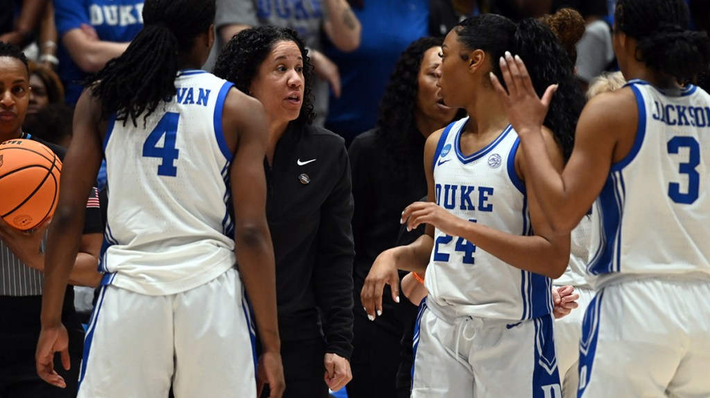 Duke Blue Devils head coach Kara Lawson (center) talks to her team during the second half against the Oregon Ducks at Cameron Indoor Stadium. The Blue Devils won 59-53.