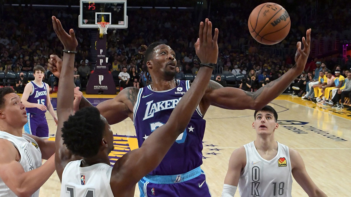 Los Angeles Lakers center Dwight Howard (39) reaches for a rebound in front of Oklahoma City Thunder forward Jaylen Hoard (14) in the second half of the game at Crypto.com Arena.
