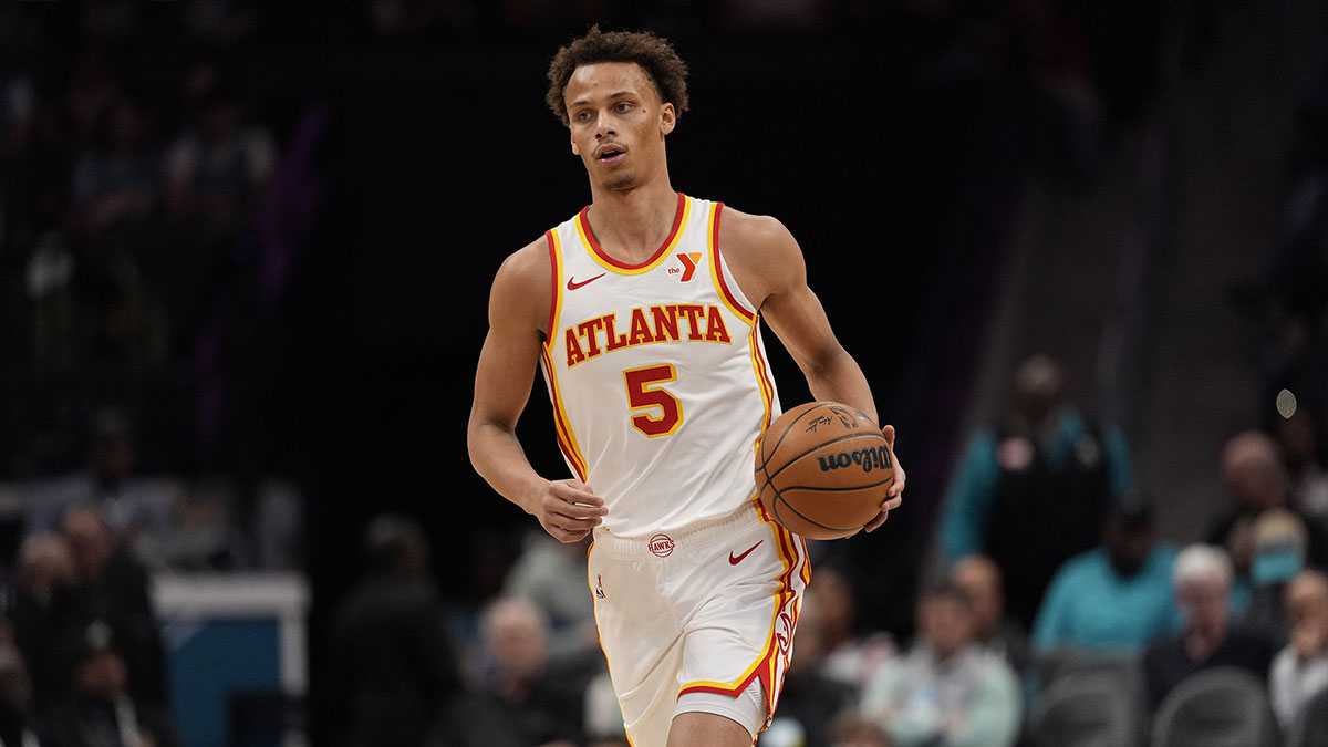 Atlanta Hawks guard Dyson Daniels (5) brings the ball up court against the Charlotte Hornets during first quarter at Spectrum Center