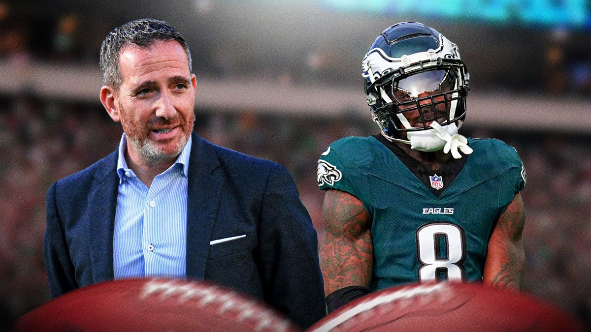 Howie Roseman next to CJ Gardner-Johnson on the Eagles field.