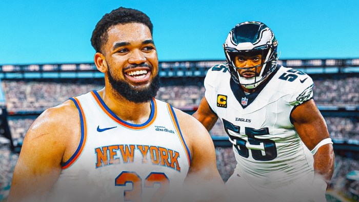 Karl-Anthony Towns next to Grandon Graham on the Eagles field.