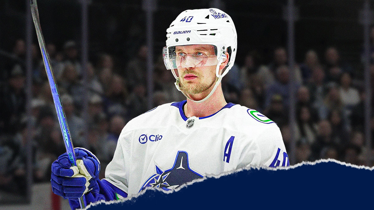 Dejected Elias Pettersson inside Rogers Arena