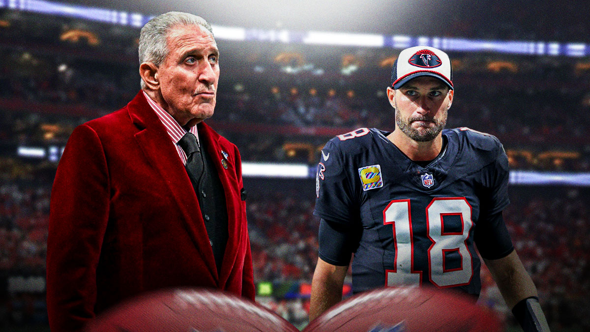 Arthur Blank next to Falcons QB Kirk Cousins