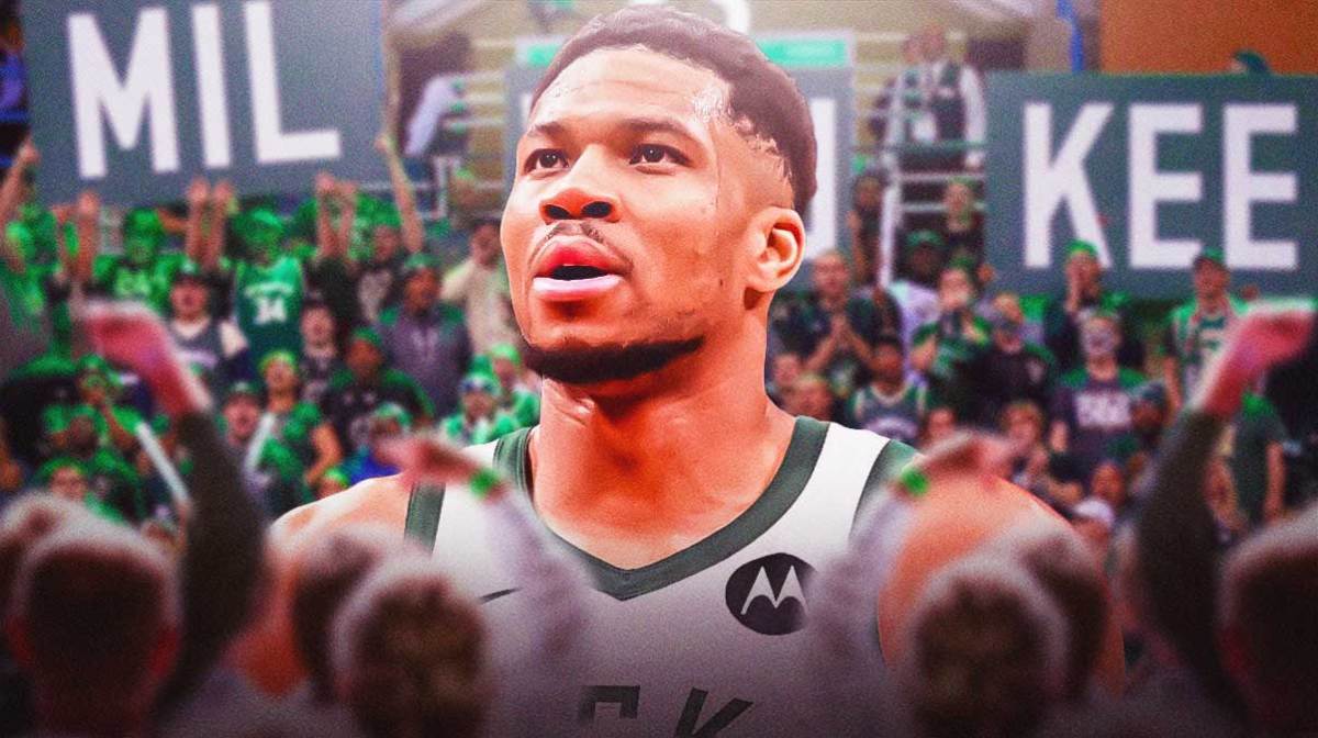 Giannis Antetokounmpo with Bucks fans cheering him