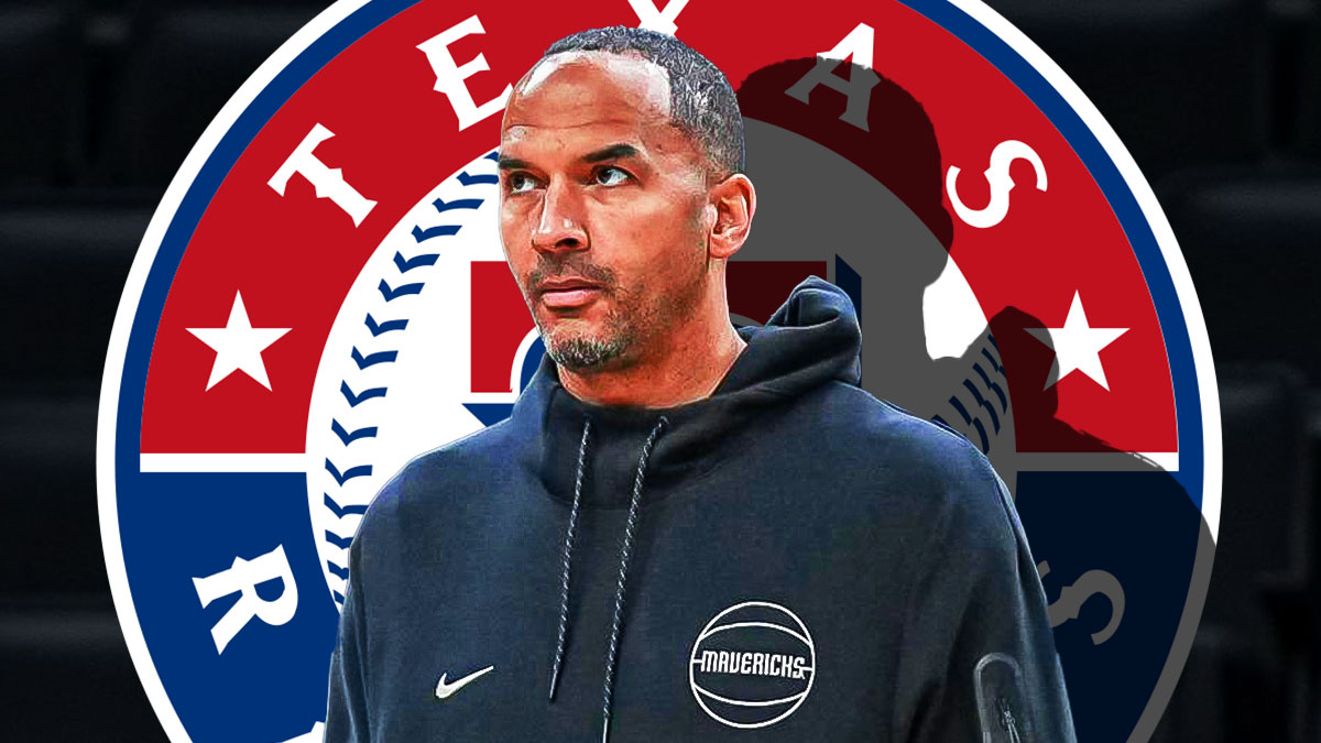 Mavs GM Nico Harrison with the Texas Rangers logo in the background