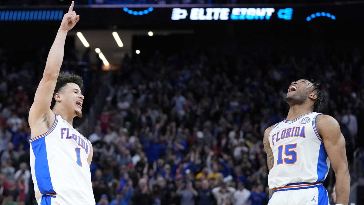 Florida Gators guard Walter Clayton Jr. (1) and guard Alijah Martin (15) celebrate defeating the Texas Tech Red Raiders during the West Regional final of the 2025 NCAA tournament at Chase Center.