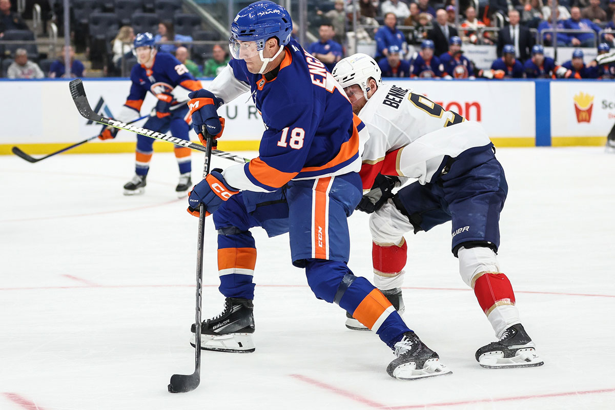  New York Islanders left wing Pierre Engvall (18) attempts a shot on goal in the second period against the Florida Panthers at UBS Arena.