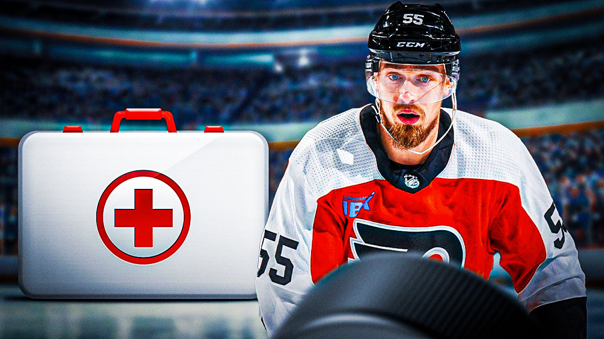 Rasmus Ristolainen looking stern, first aid kit, hockey rink in background