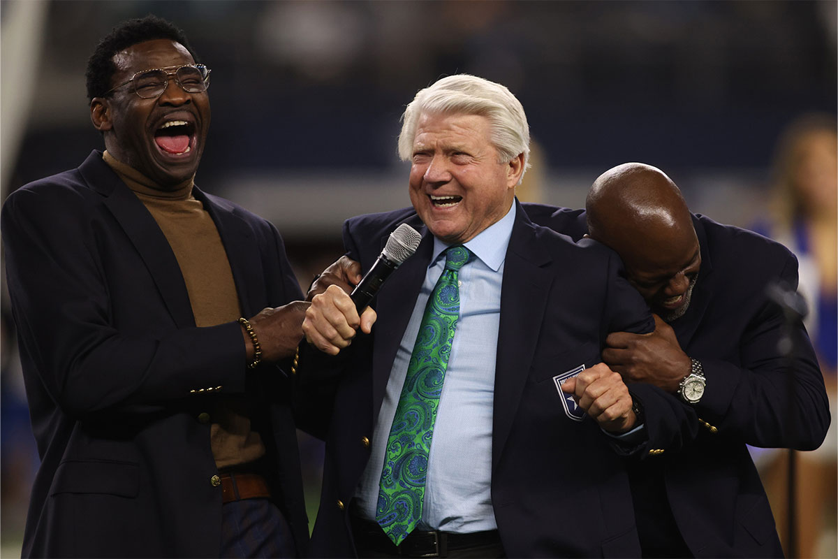 (L to R) Former Dallas Cowboys Michael Irvin, Jimmy Johnson and Emmitt Smith react during the Ring of Honor ceremony at the half time of the game against the Detroit Lions at AT&T Stadium.