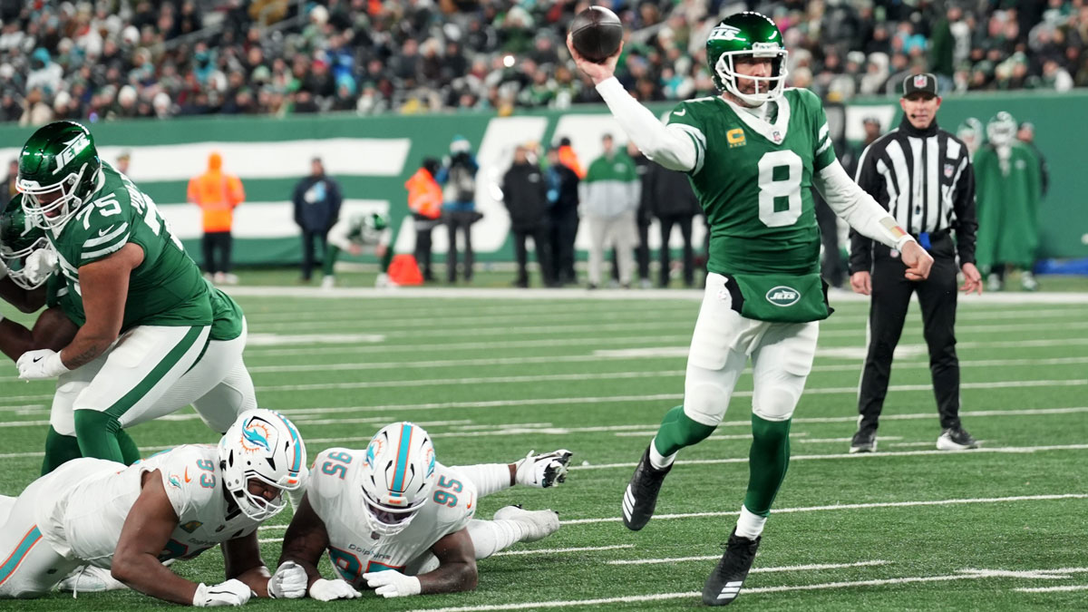 New York Jets quarterback Aaron Rodgers (8) throws his 500th career touchdown pass in the second quarter of the game against the Miami Dolphins on Jan. 5, 2025, in East Rutherford, N.J.