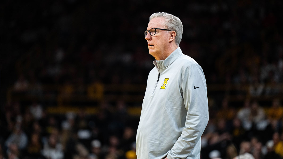 Iowa Hawkeyes head coach Fran McCaffrey watches from the bench during the first half against the Wisconsin Badgers at Carver-Hawkeye Arena.