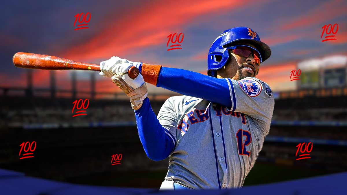 Francisco Lindor batting in a New York Mets uniform with a 100 emoji next to him as lindor has strugged at the plate in a slow start to the season for the mets.