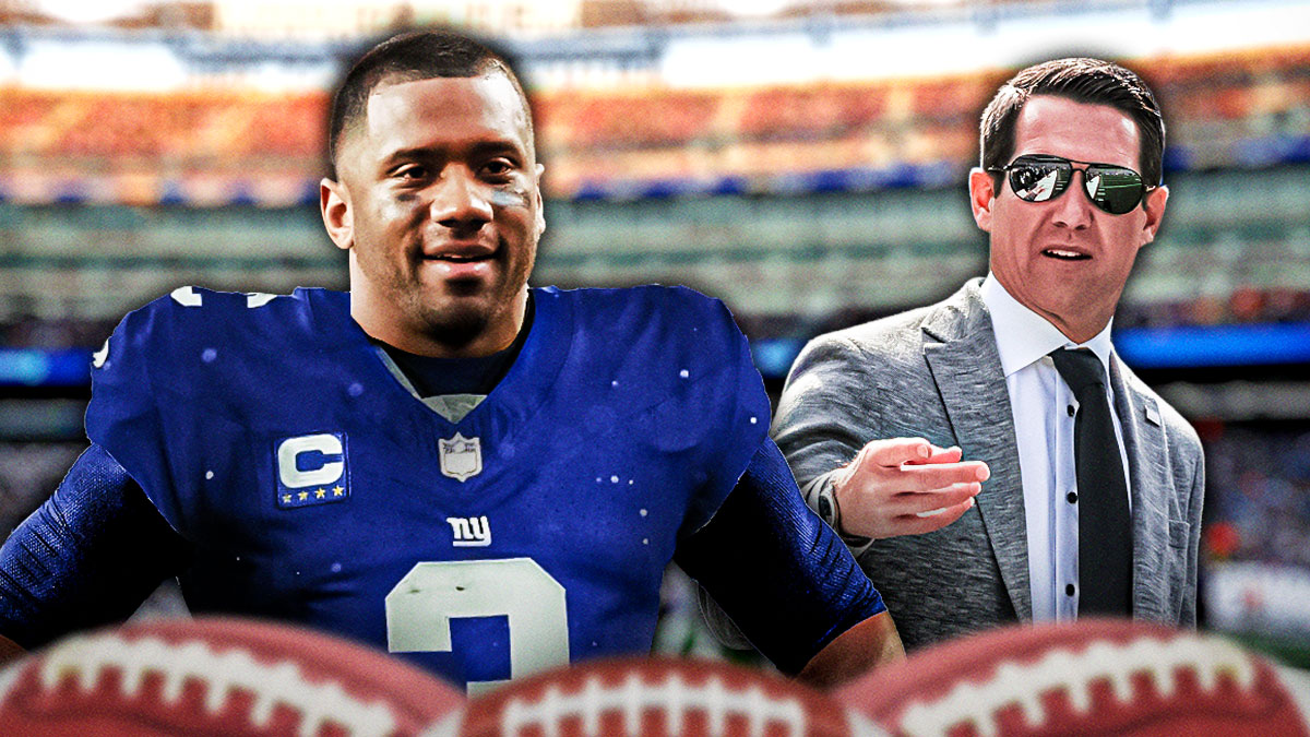 Giants general manager Joe Schoen with Russell Wilson next to him, in a Giants jersey, smiling.