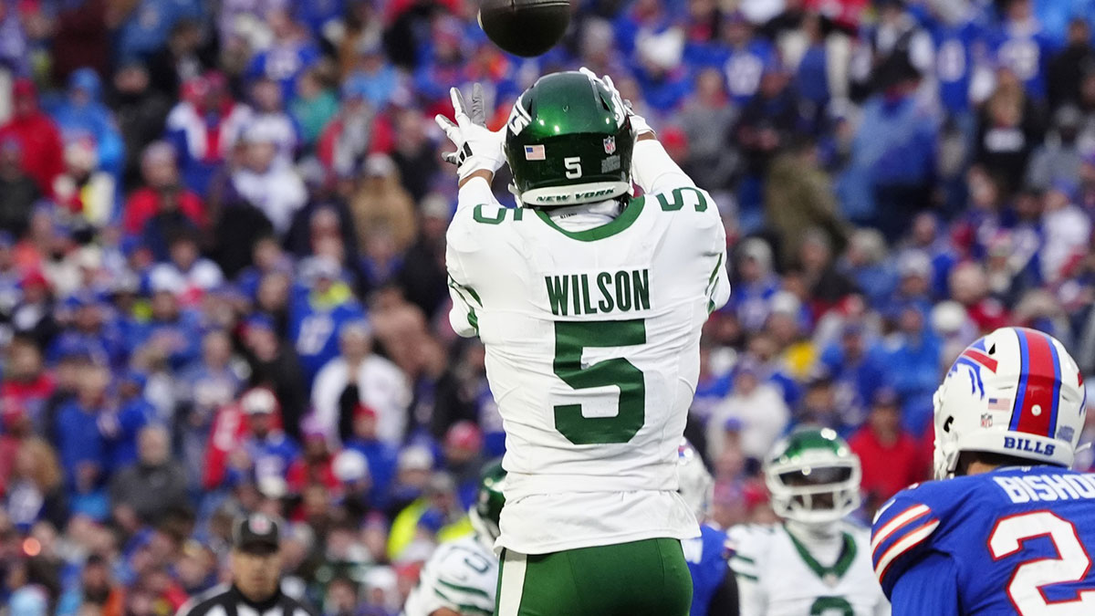 Dec 29, 2024; Orchard Park, New York, USA; New York Jets wide receiver Garrett Wilson (5) makes a catch against the Buffalo Bills during the second half at Highmark Stadium. 