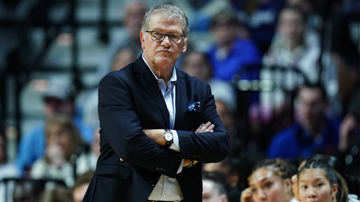 UConn Huskies head coach Geno Auriemma watches from the sideline as they take on the Creighton Bluejays at Mohegan Sun Arena.