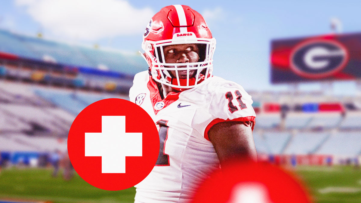 Jalon Walker next to a medical cross on the Georgia football field