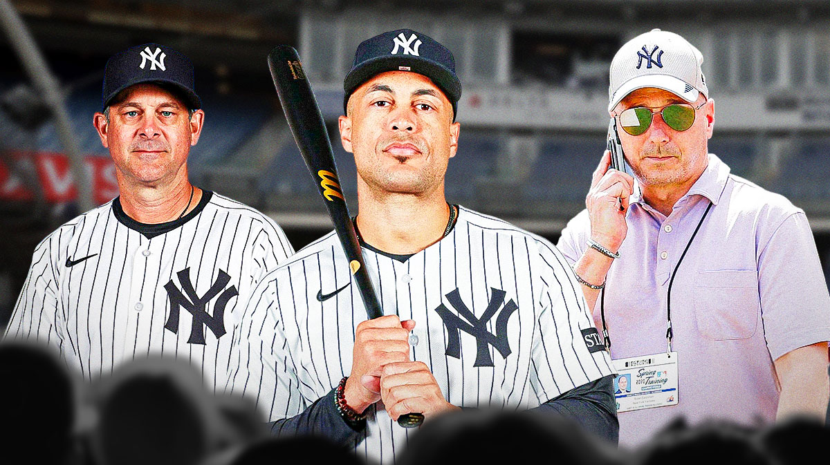 Giancarlo Stanton, Aaron Boone, Brian Cashman.