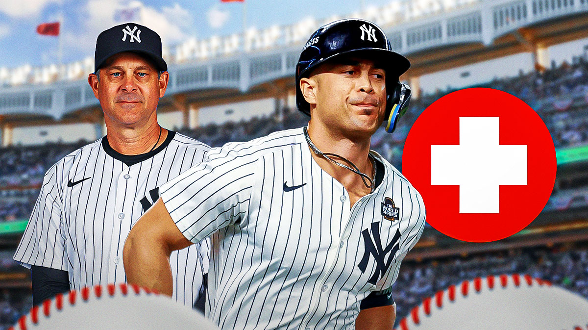 New York Yankees DH Giancarlo Stanton in pain/upset in center, New York Yankees manager Aaron Boone on left side, Health/Injury symbol on right side, Yankee Stadium (home field of the New York Yankees) in background