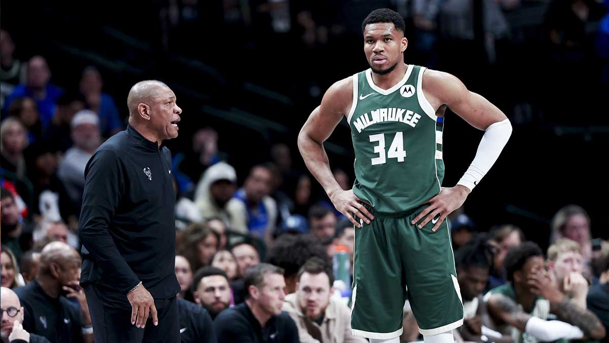 Milwaukee Bucks head coach Doc Rivers speaks to Milwaukee Bucks forward Giannis Antetokounmpo (34) during the second half against the Dallas Mavericks at American Airlines Center. 