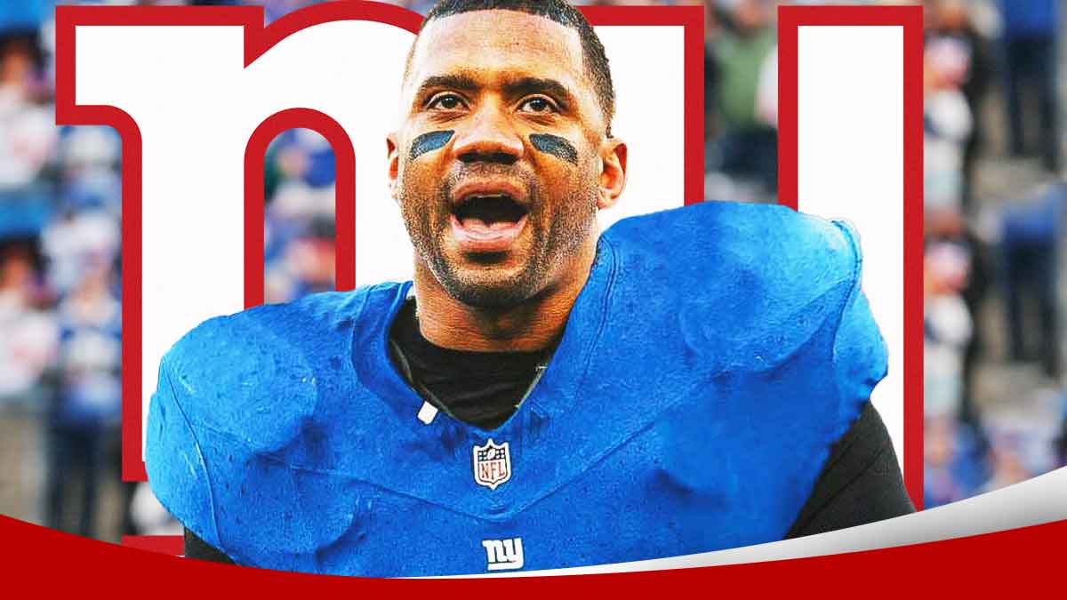 image of Giants quarterback Russell Wilson smiling. Giants logo in background