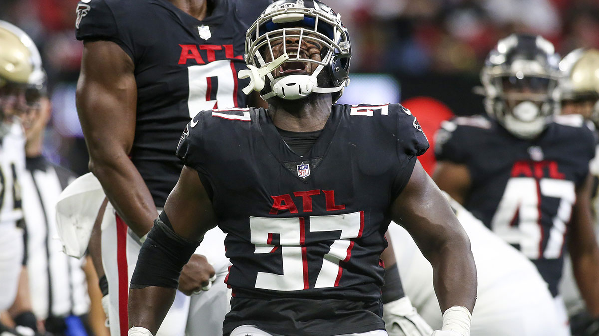 Atlanta Falcons defensive end Grady Jarrett (97) celebrates after a sack against the New Orleans Saints in the second quarter at Mercedes-Benz Stadium. 