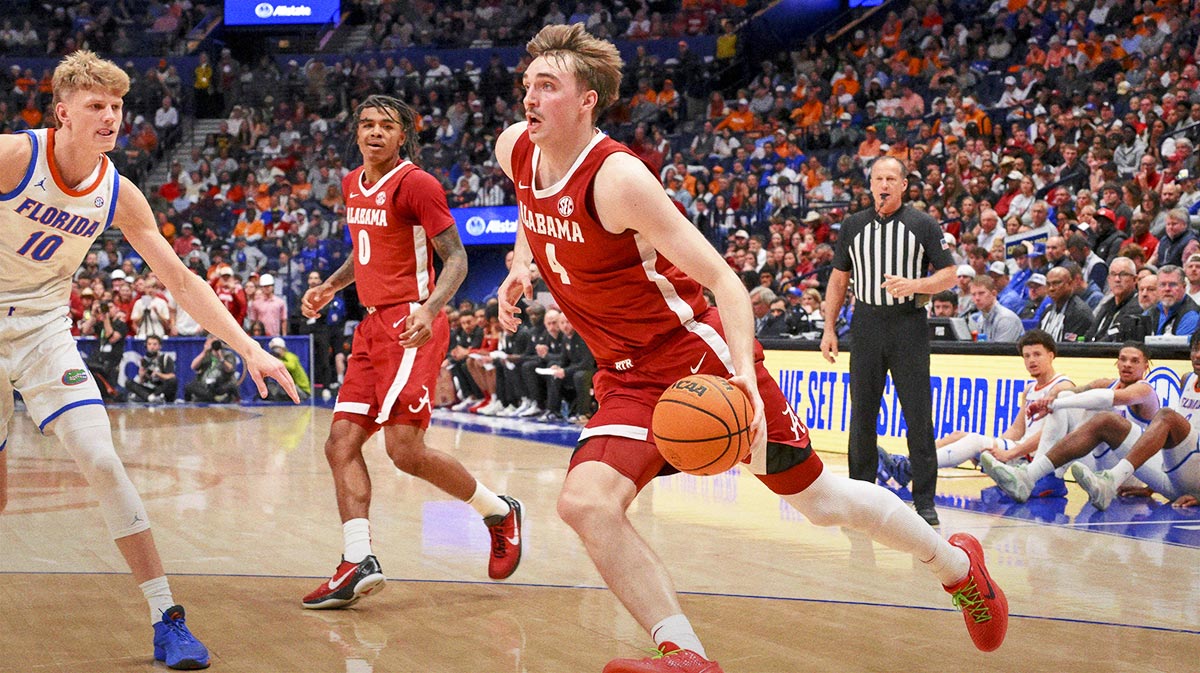 Alabama Crimson Tide forward Grant Nelson (4) drives to the basket against the Florida Gators during the first half at Bridgestone Arena.